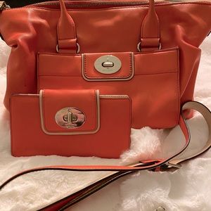 Beautiful Coral Kate Spade Gently Used Purse and wallet.